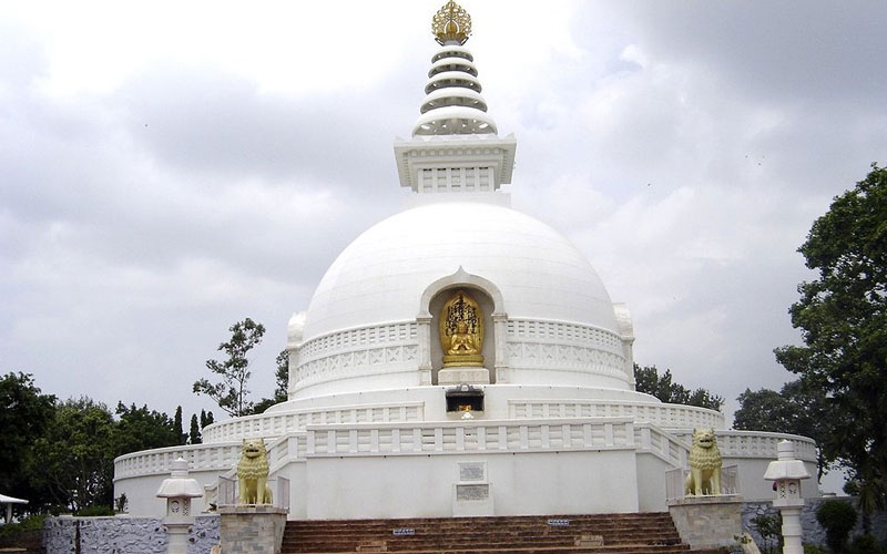 Scenic view of Vishwa Shanti Stupa, Rajgir, Bihar, a historic pilgrimage destination.